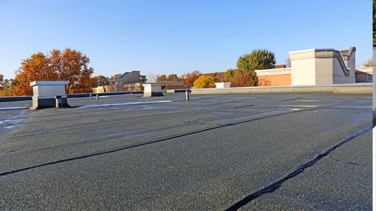 EPDM rubber roofing being installed